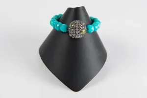 Faceted turquoise with rock crystal and peridot bead