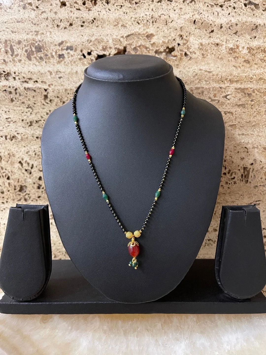 Modern Stylish Short Mangalsutra Designs Oval Pendant With Latkan Simple Black Beads Chain