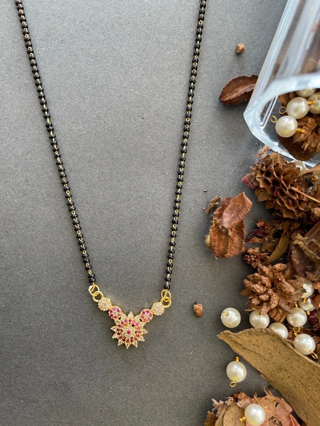 Stylish Short Mangalsutra Designs American Diamond Flower Pendant Simple Black Beads Chain
