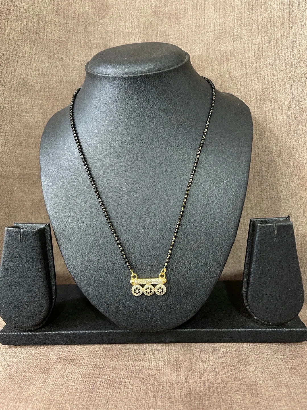 Trendy Short Mangalsutra Designs American Diamond Flower Pendant Simple Black Beads Chain