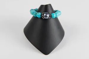 Turquoise with mother of pearl and pave diamond bead caps